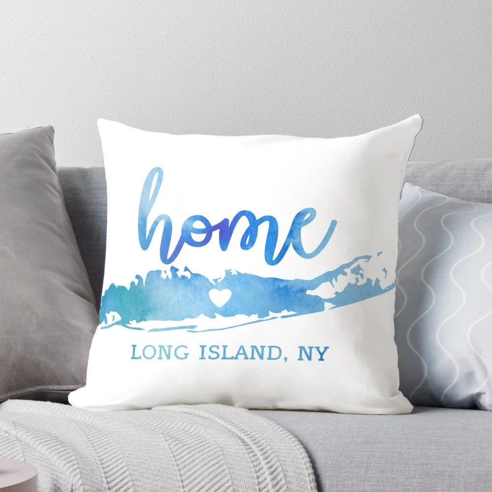 Soft, blue watercolor-inspired pillow featuring the text "Long Island" and a scenic coastal design.