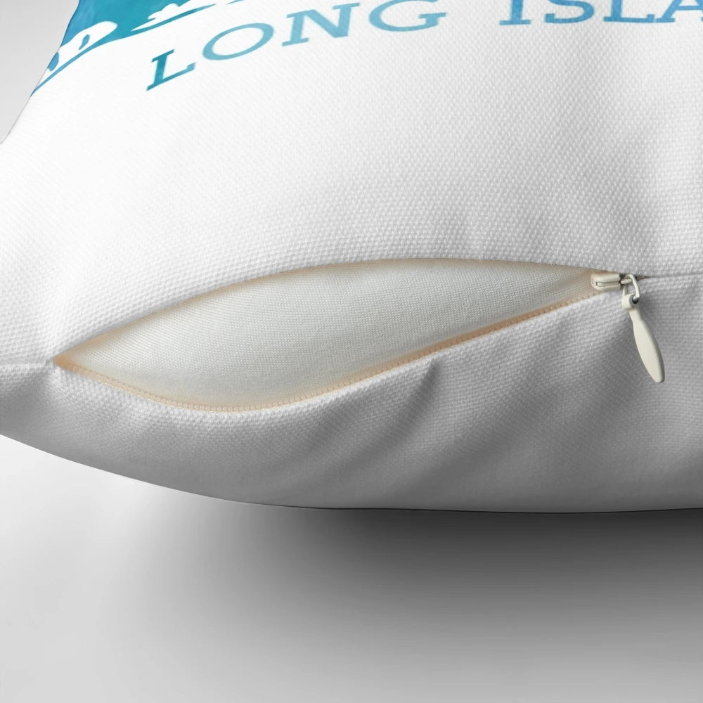 Soft, blue watercolor-inspired pillow featuring the text "Long Island" and a scenic coastal design.