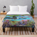 Loons and water lilies printed on a soft, plush blanket