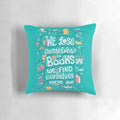 A soft, plush pillow with a whimsical design featuring books, a unicorn, and a castle, perfect for book lovers.