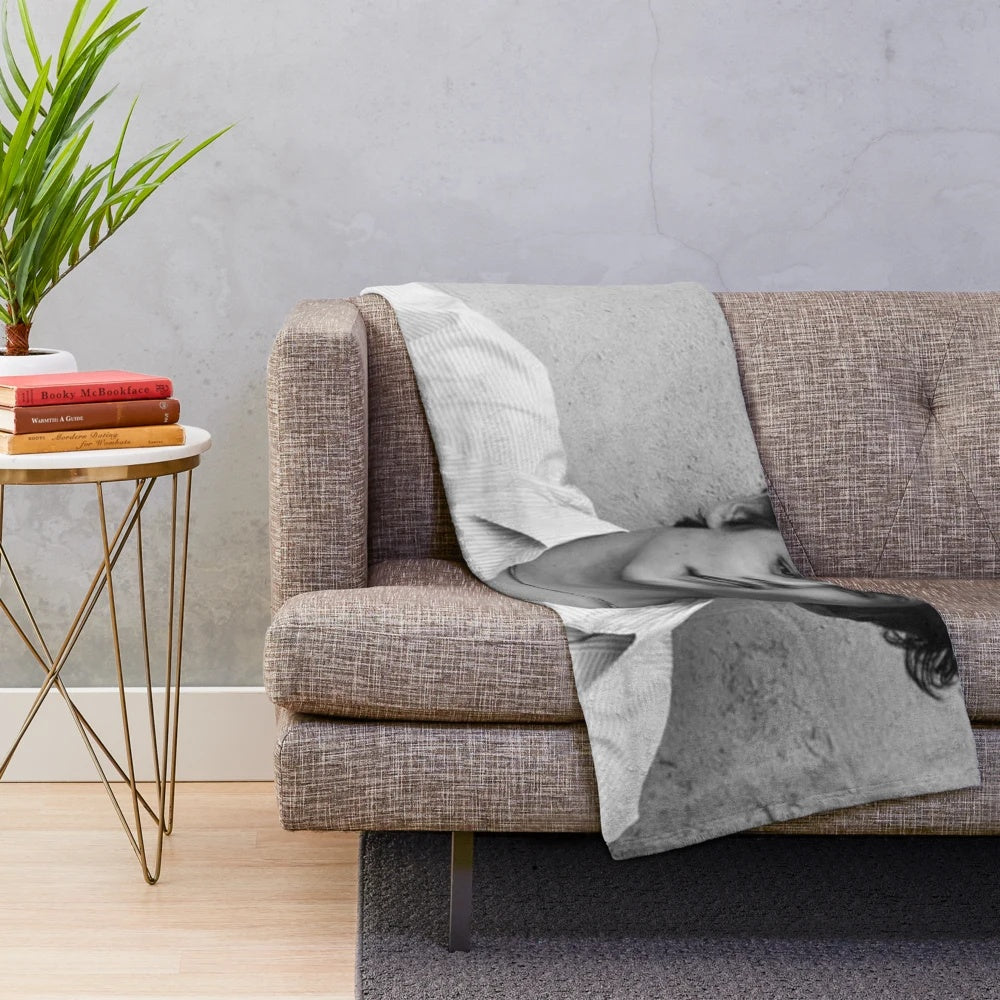 Soft, black and white plush blanket featuring Louis Partridge, the popular Enola Holmes Netflix actor