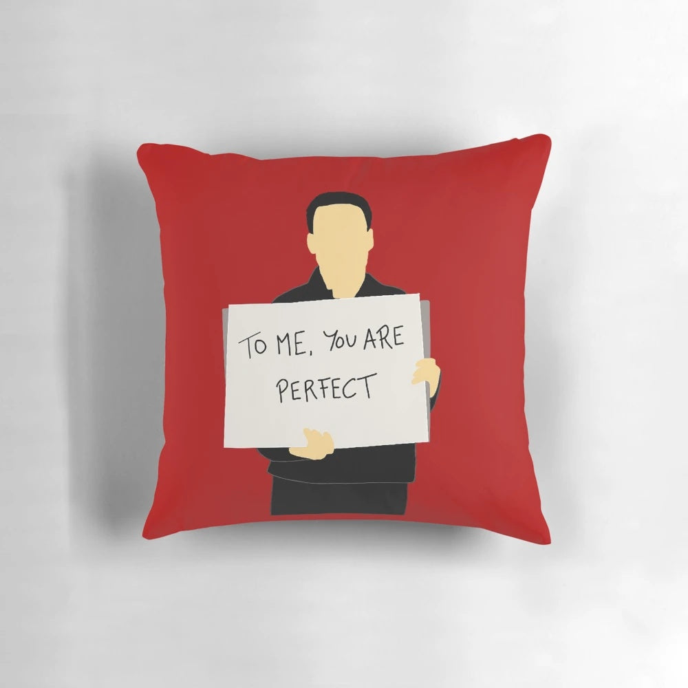 A plush, high-quality pillow featuring the iconic movie "Love Actually" for a cozy, holiday-inspired home.
