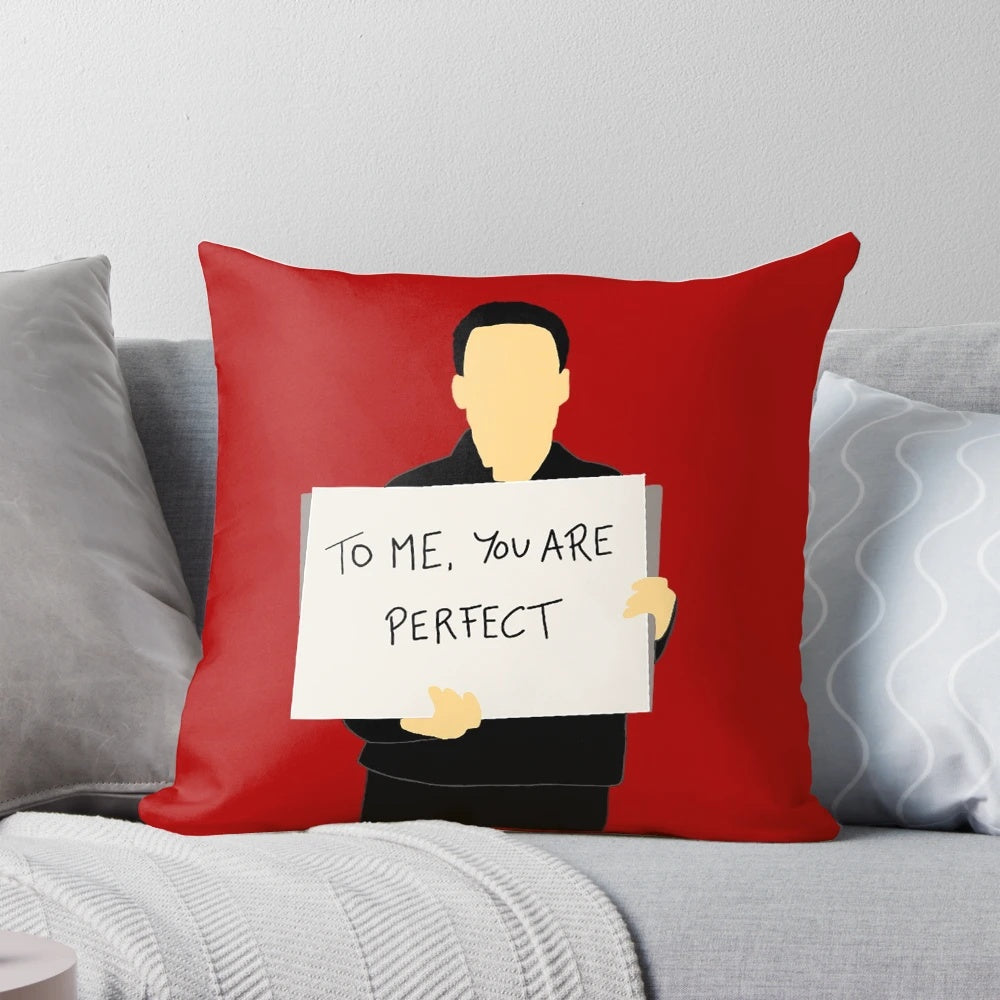 A plush, high-quality pillow featuring the iconic movie "Love Actually" for a cozy, holiday-inspired home.