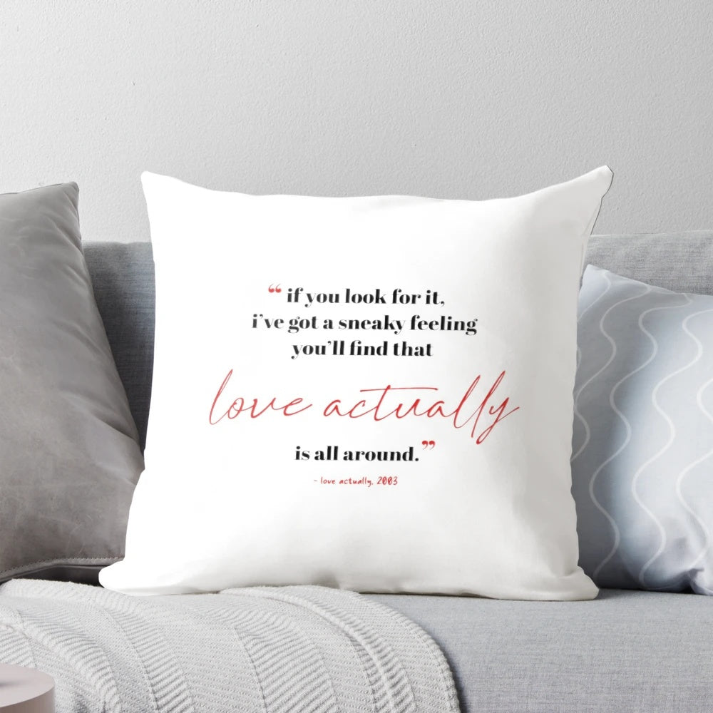 Soft, white pillow featuring a quote from the beloved Christmas movie "Love Actually"
