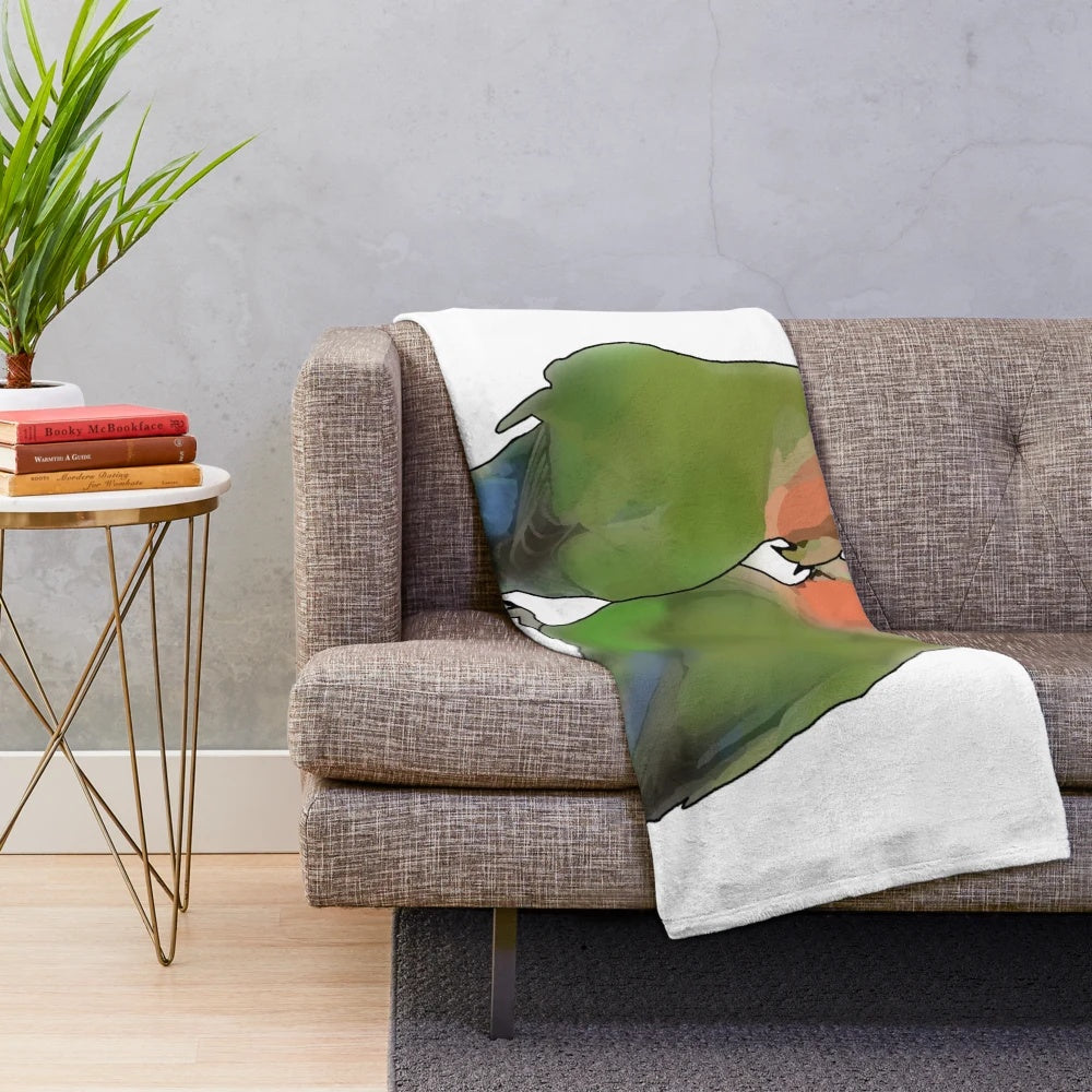 Green lovebirds cuddling on a plush blanket