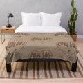 Lovejoy-inspired plush blanket featuring neutral colors and a cozy design