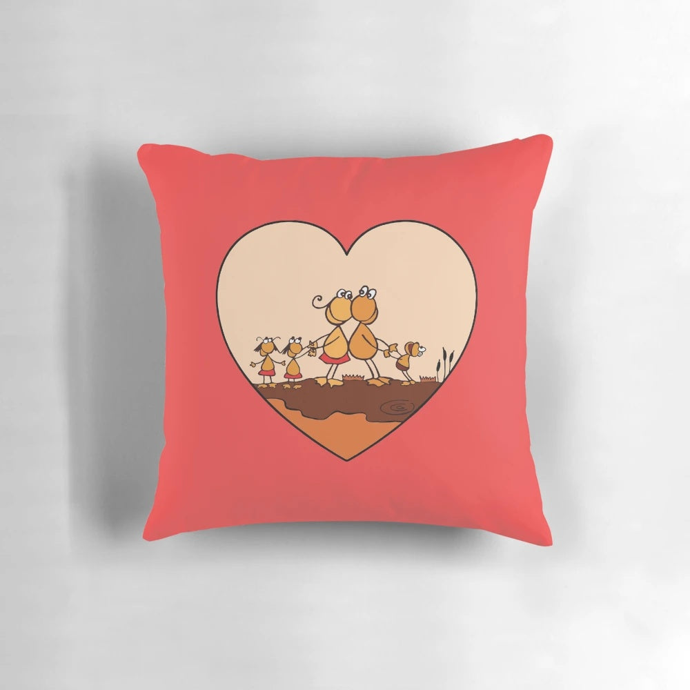 A plush pillow featuring a loving family of adorable frogs, perfect for home decor.