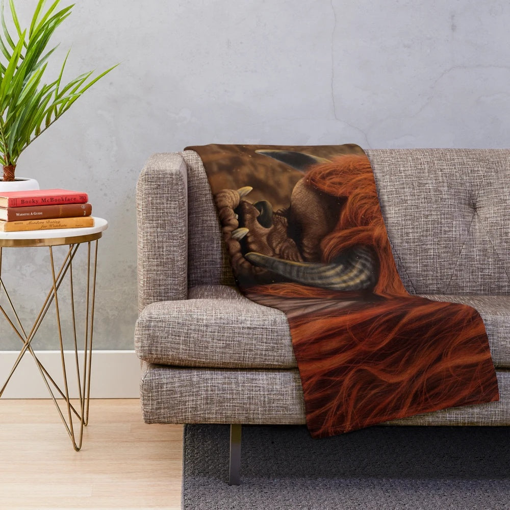 Ludo the friendly creature from the movie Labyrinth on a cozy plush blanket