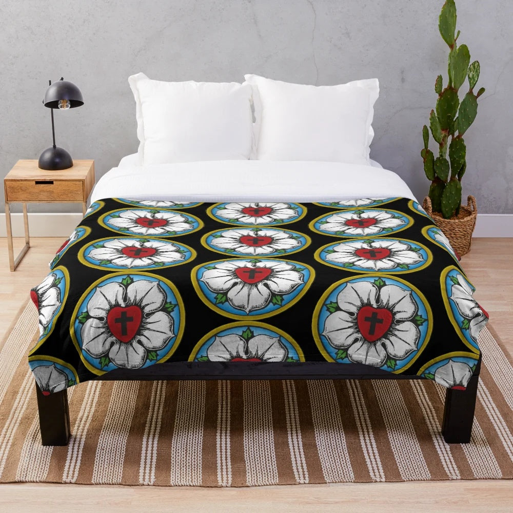 Plush blanket featuring the Luther Rose, a Christian symbol associated with Lutheranism