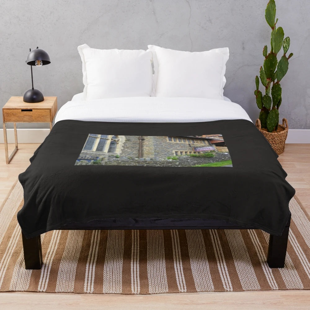 Soft and plush blanket featuring the iconic Lynton Cinema logo and design