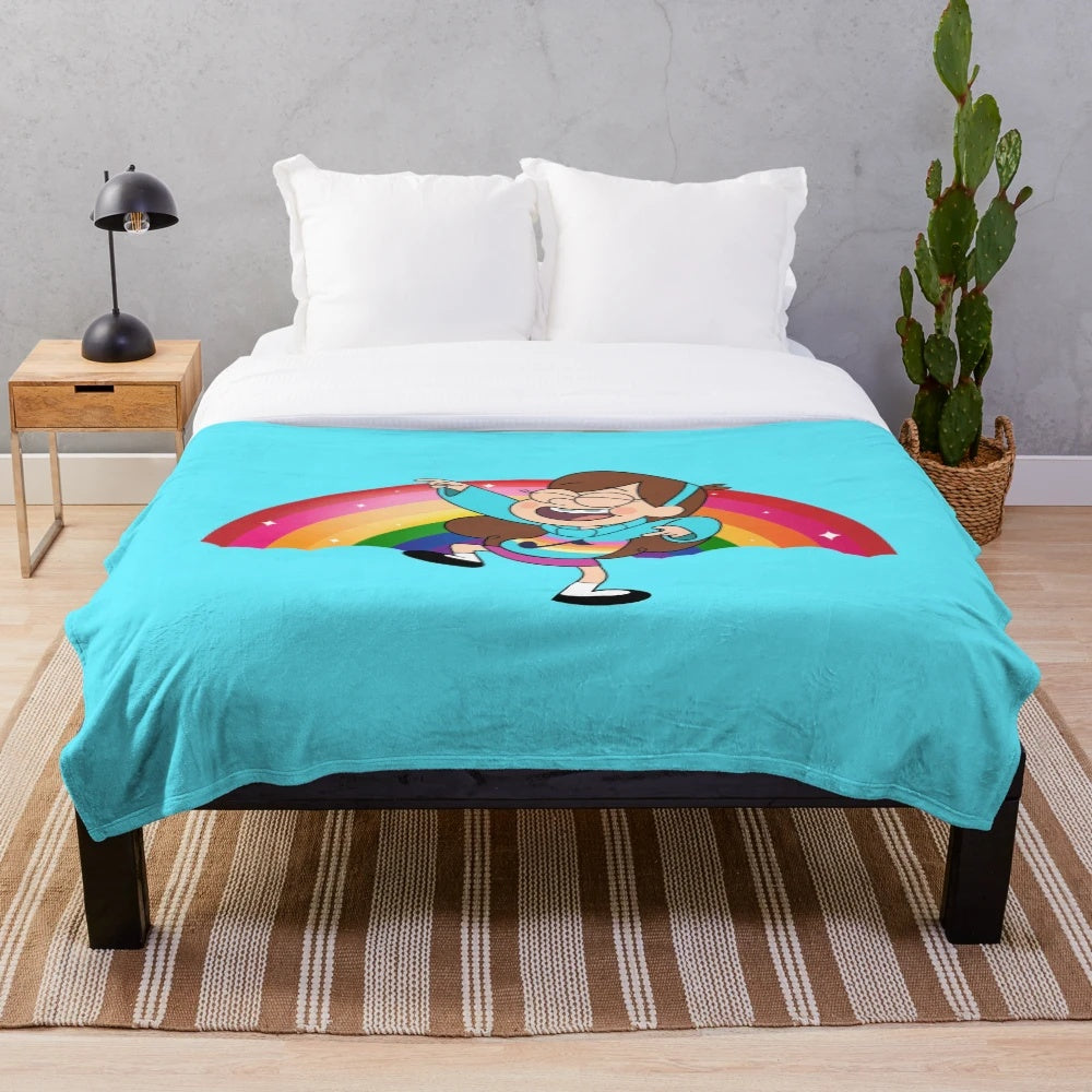 Mabel Pines, the energetic teenager from Gravity Falls, dancing on a rainbow background on a plush blanket.