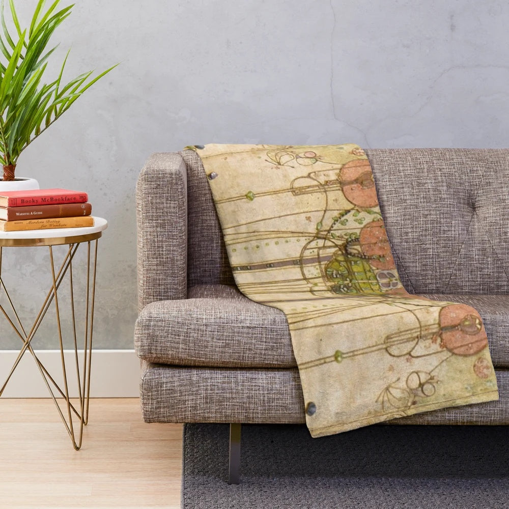 Plush blanket featuring Charles Rennie Mackintosh's iconic floral art design
