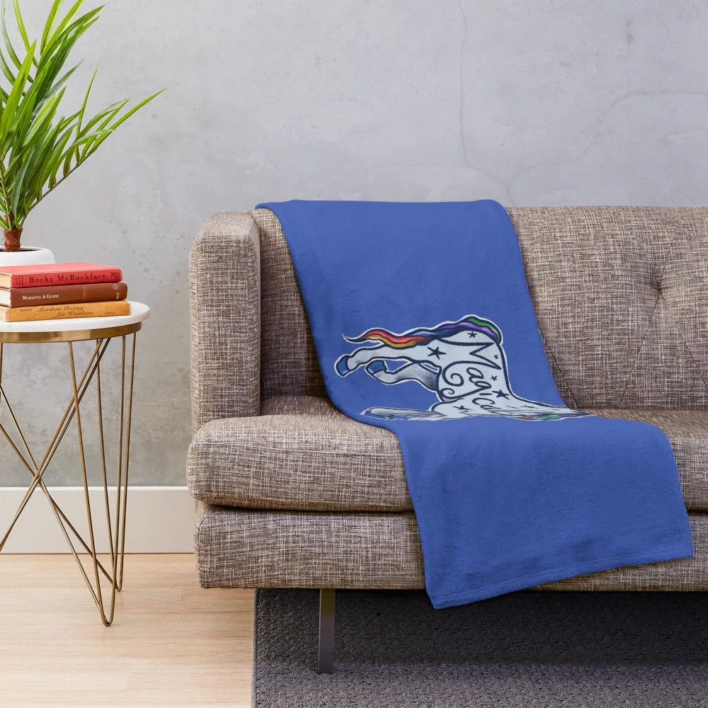 Magical unicorn plush blanket with vibrant rainbow design