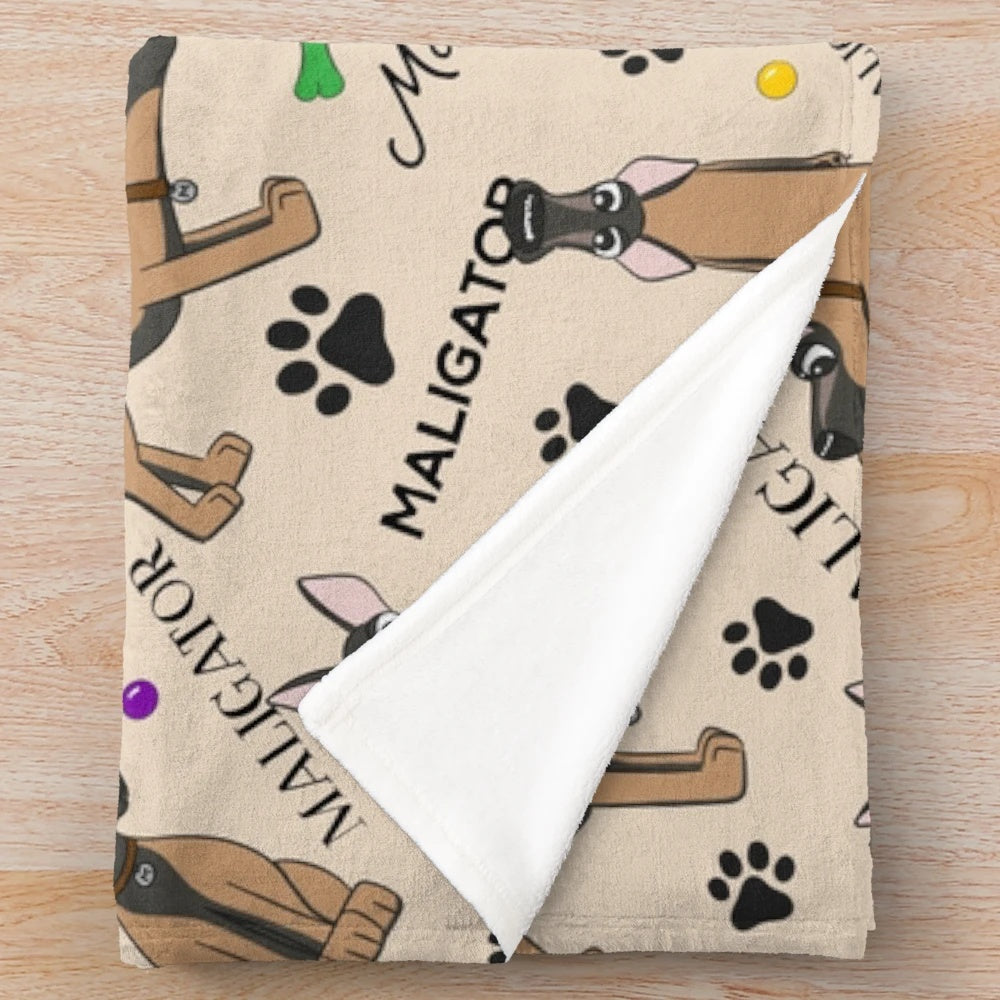 Soft and snuggly plush blanket featuring an adorable maligator or Belgian shepherd dog breed
