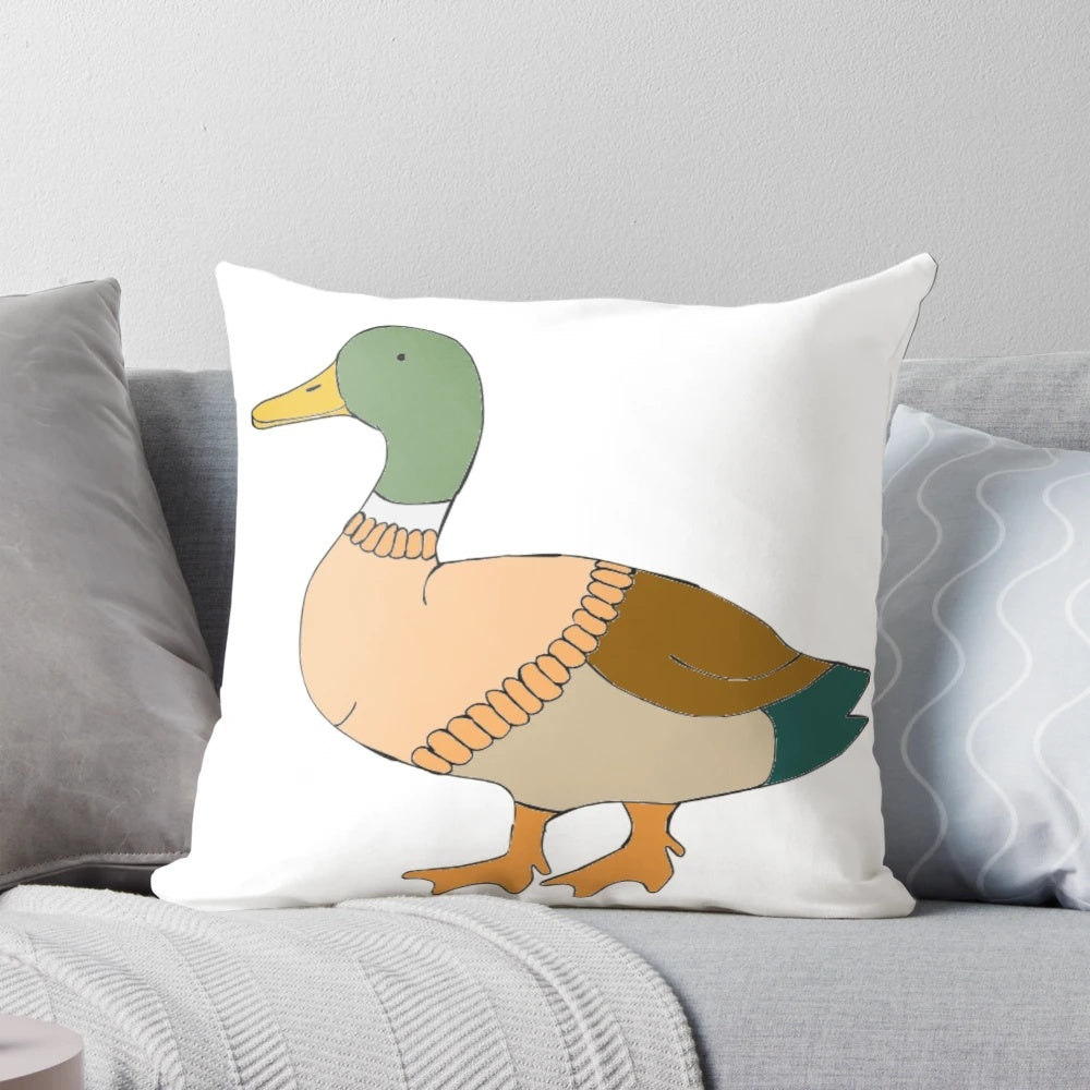 Decorative pillow featuring a mallard duck wearing a knitted sweater