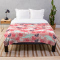 Soft, plush manatee-themed blanket with underwater seascape pattern