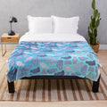 Manatee plush blanket with cute ocean-themed pattern