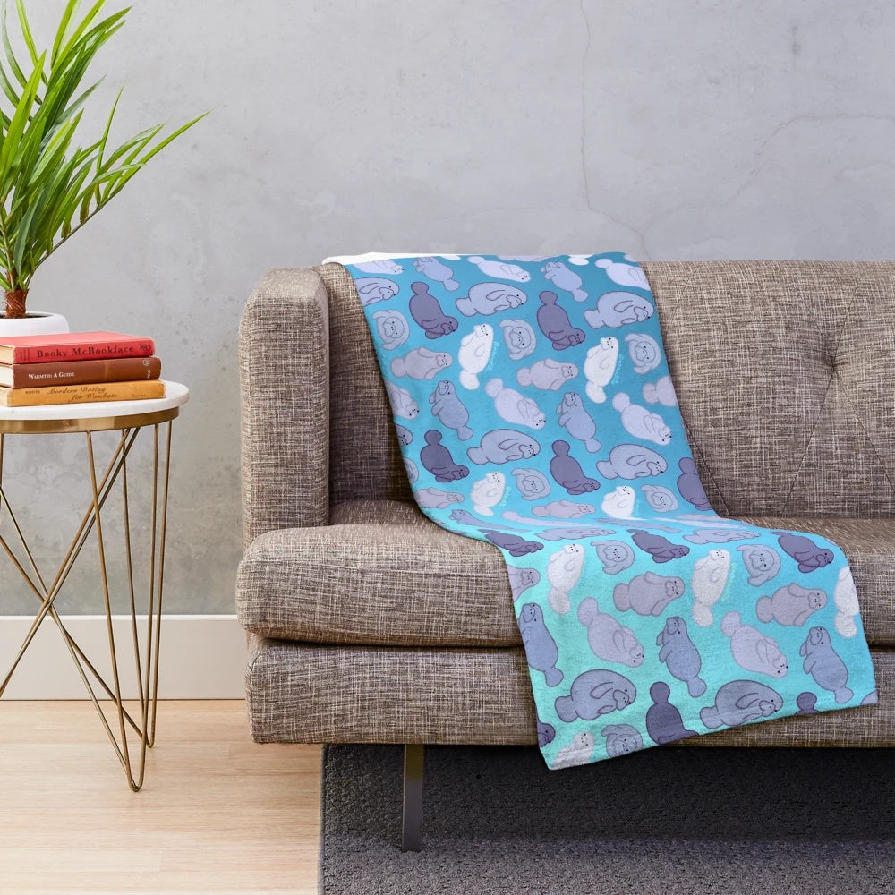 Manatee plush blanket with cute ocean-themed pattern