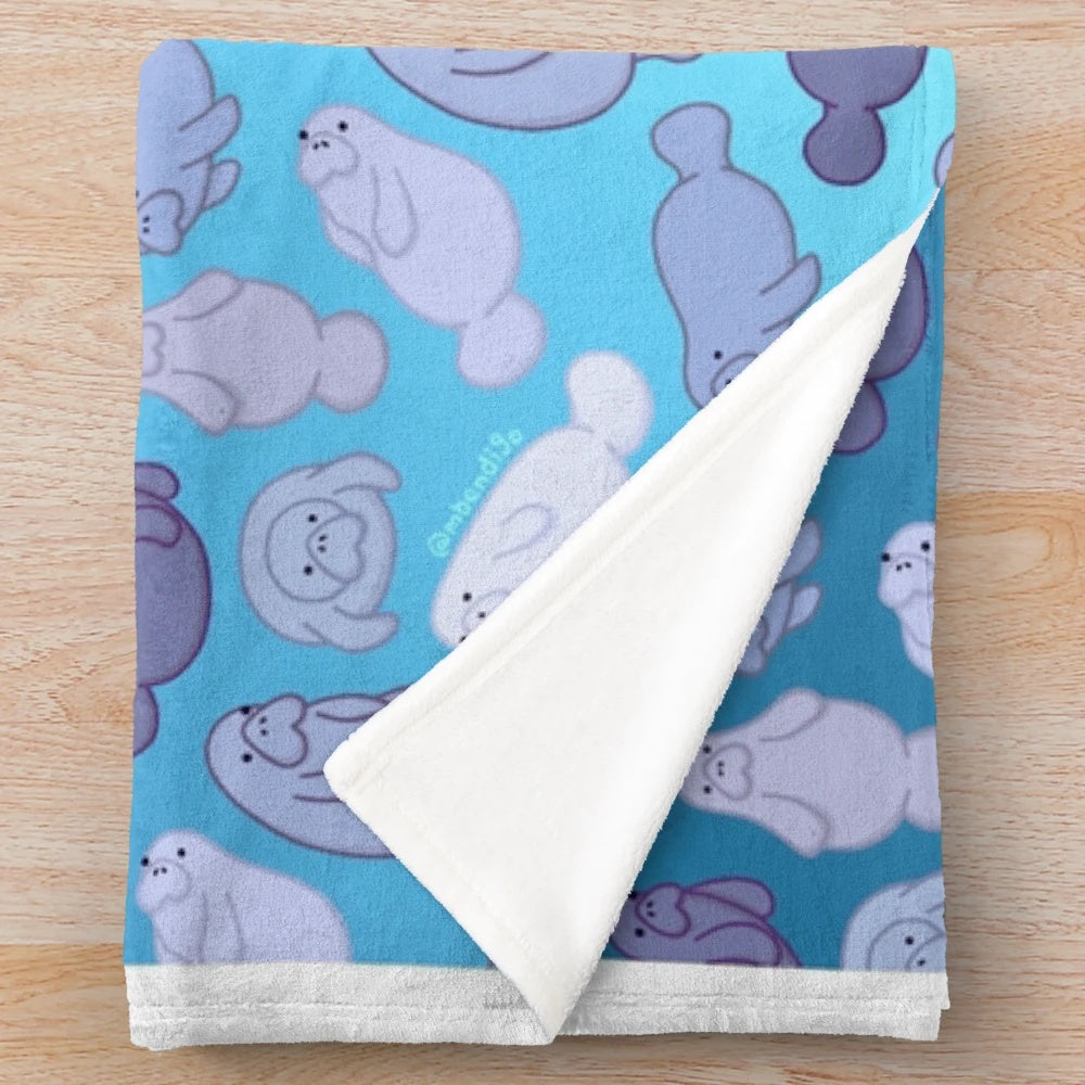 Manatee plush blanket with cute ocean-themed pattern