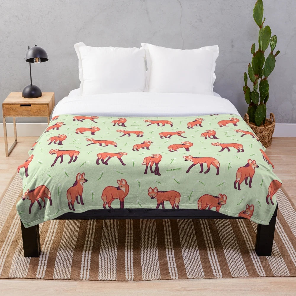 Maned wolf plush blanket with a repeating pattern design