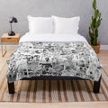 Cozy manga panels collage plush blanket featuring popular anime characters and black and white designs