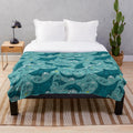 Manta ray plush blanket with detailed underwater sea creature design