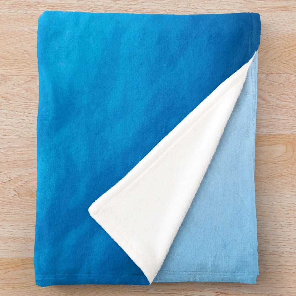 Manta ray swimming in the blue ocean plush blanket