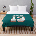 Soft and warm plush blanket with a marine-inspired design for sports fans