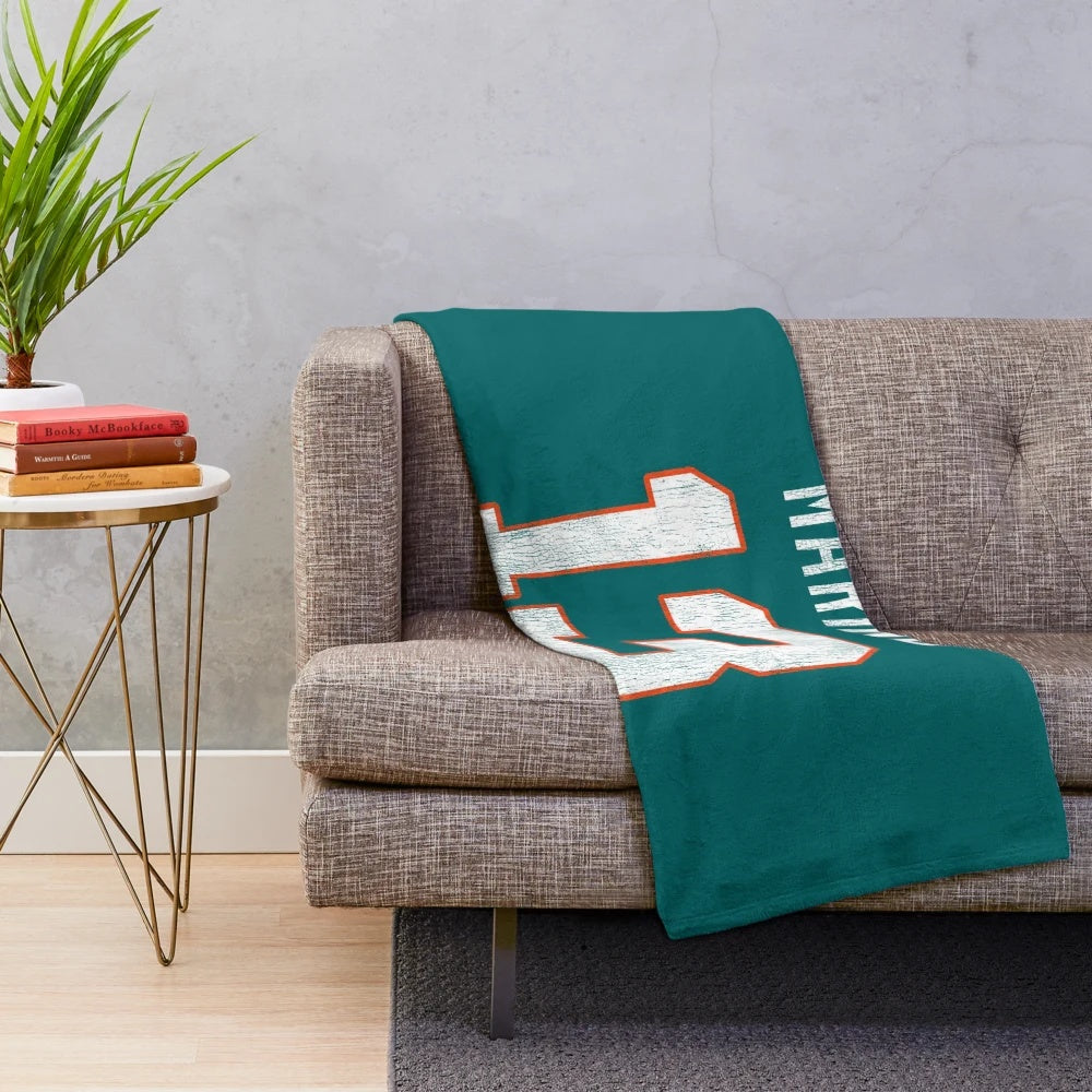 Soft and warm plush blanket with a marine-inspired design for sports fans