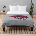 Plush blanket featuring the Maroons logo for college sports fans
