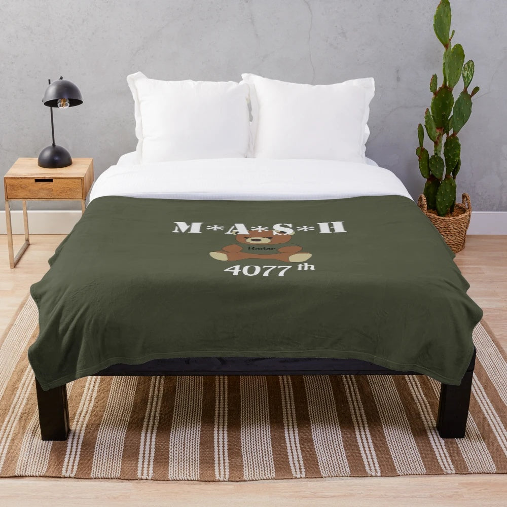 MASH-themed plush blanket featuring iconic imagery from the beloved TV show and movie