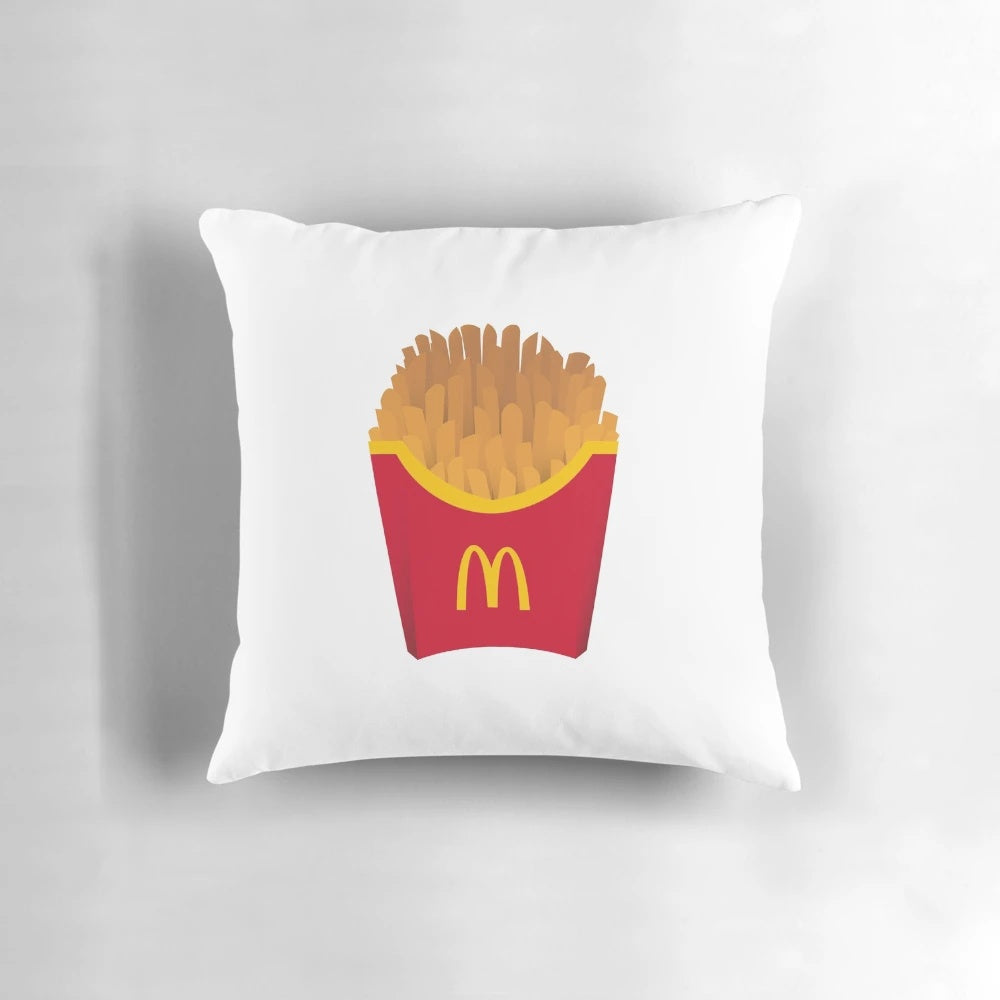 A soft, plush pillow designed to look like McDonald's famous french fries, perfect for adding a touch of fast food fun to any home.