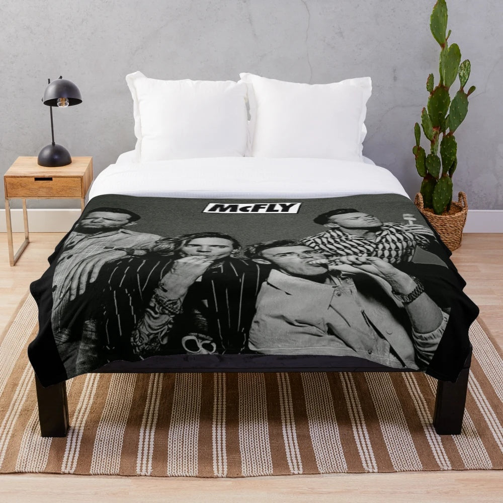 McFly-inspired plush blanket with the band's logo and artwork