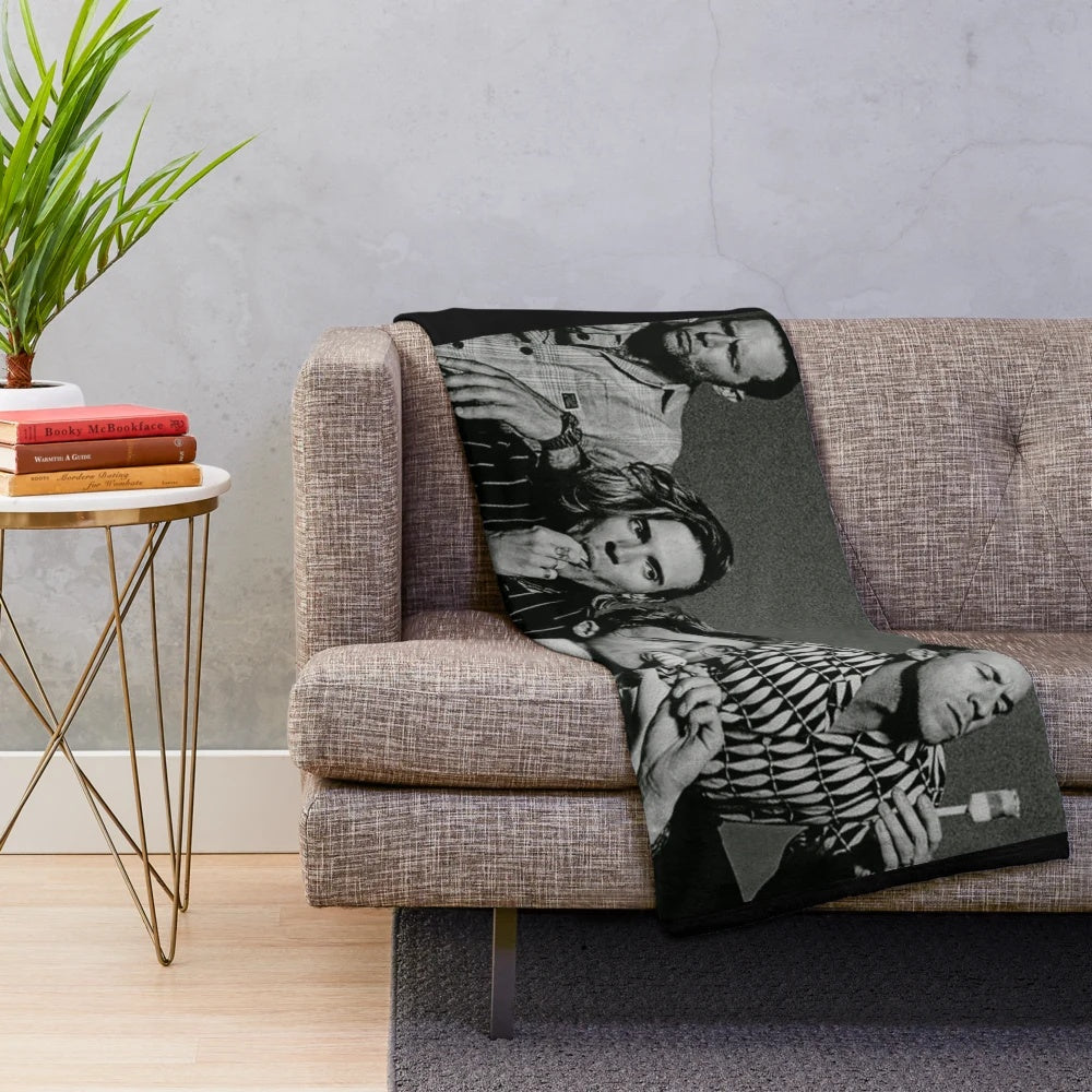 McFly-inspired plush blanket with the band's logo and artwork