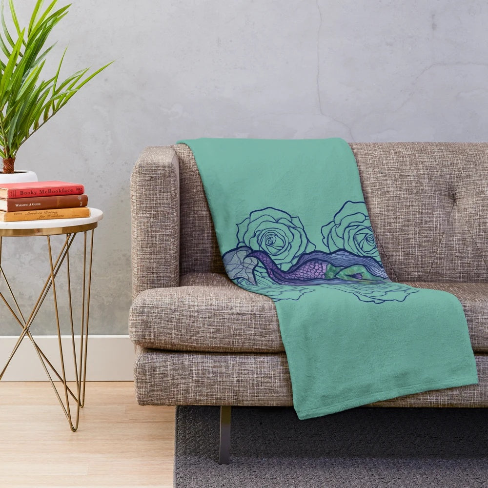 Mermaid-themed plush blanket in soft, cozy fabric