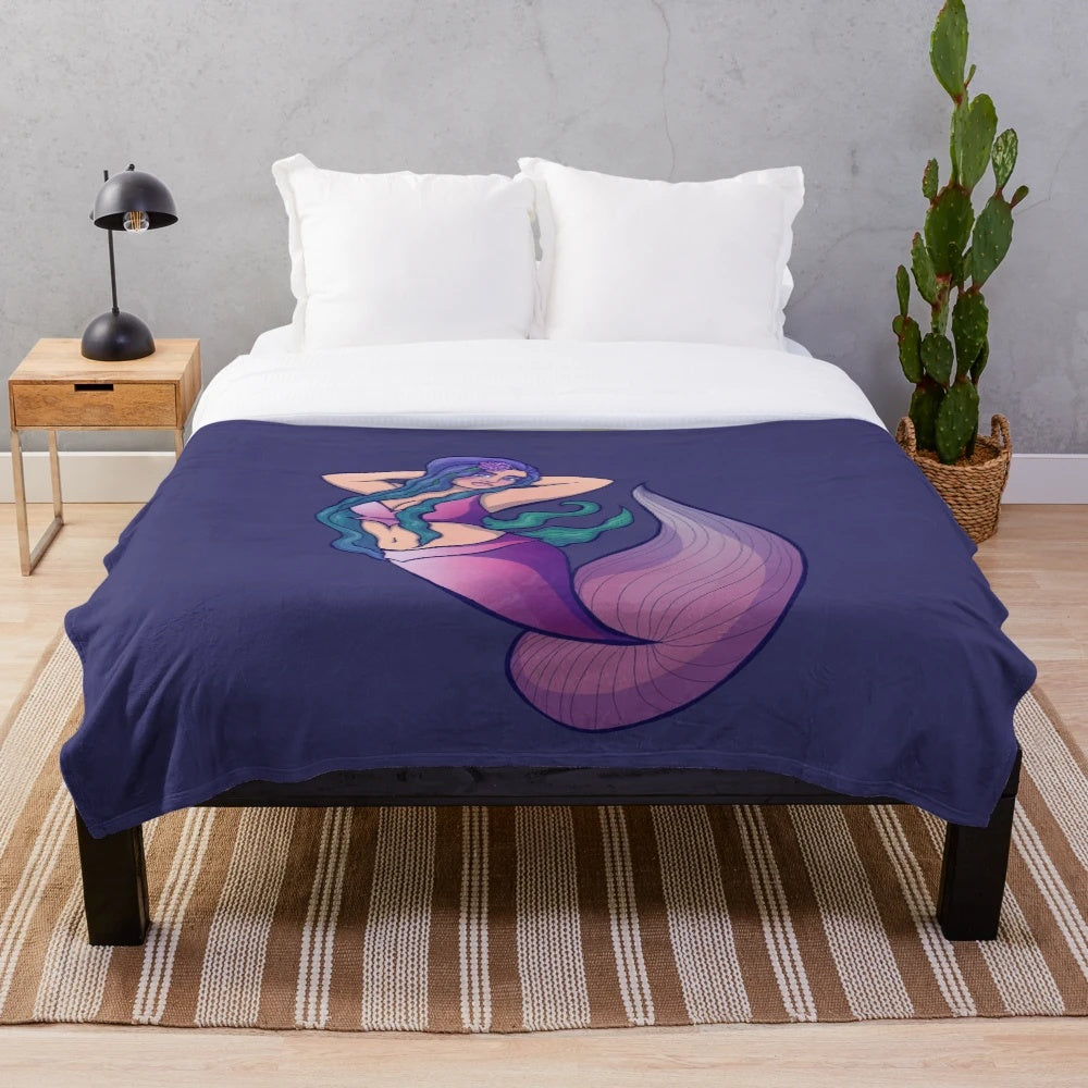 Soft and cuddly mermaid plush blanket with an ocean-inspired design