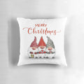 A plush, festive pillow featuring cute cartoon Christmas gnomes in a whimsical design.
