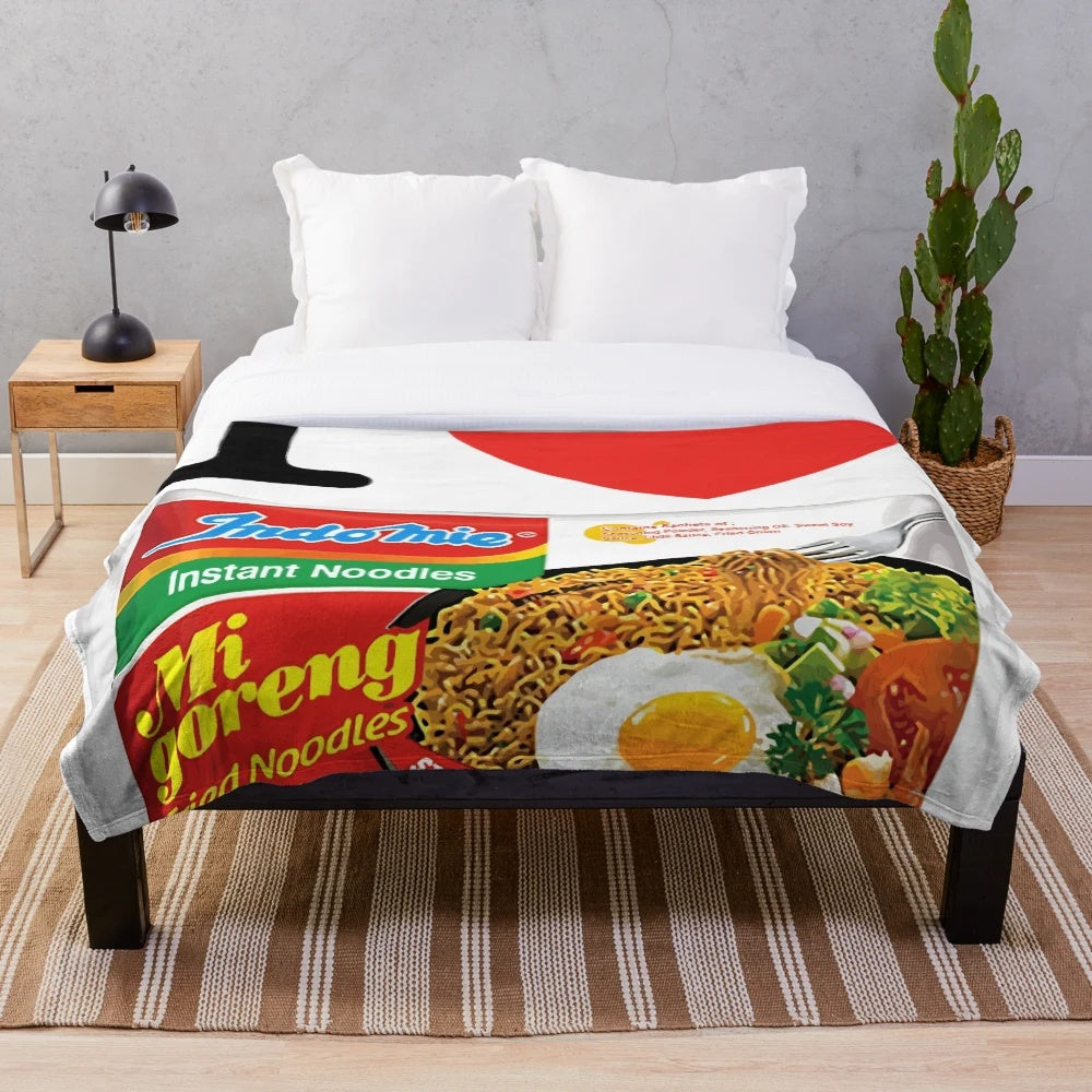 Mi Goreng inspired plush blanket with Indomie noodle design