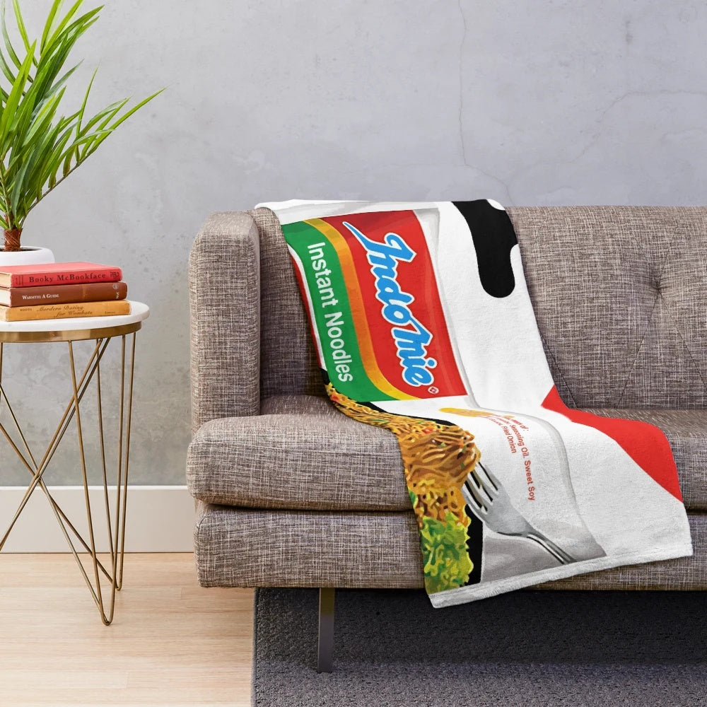 Mi Goreng inspired plush blanket with Indomie noodle design