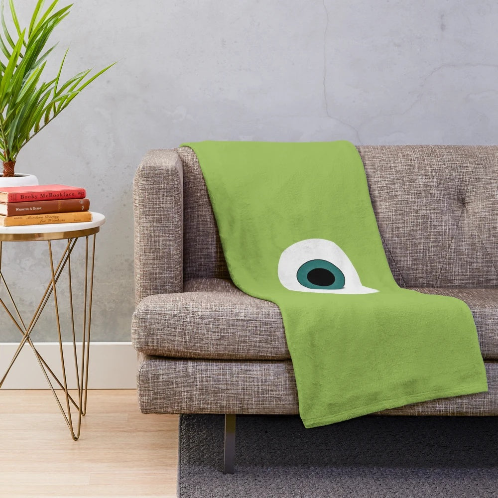 Mike Monster from Pixar's Monsters Inc. featured on a plush blanket