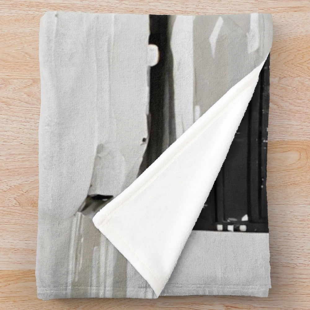 Plush blanket with minimalist car-inspired abstract art design