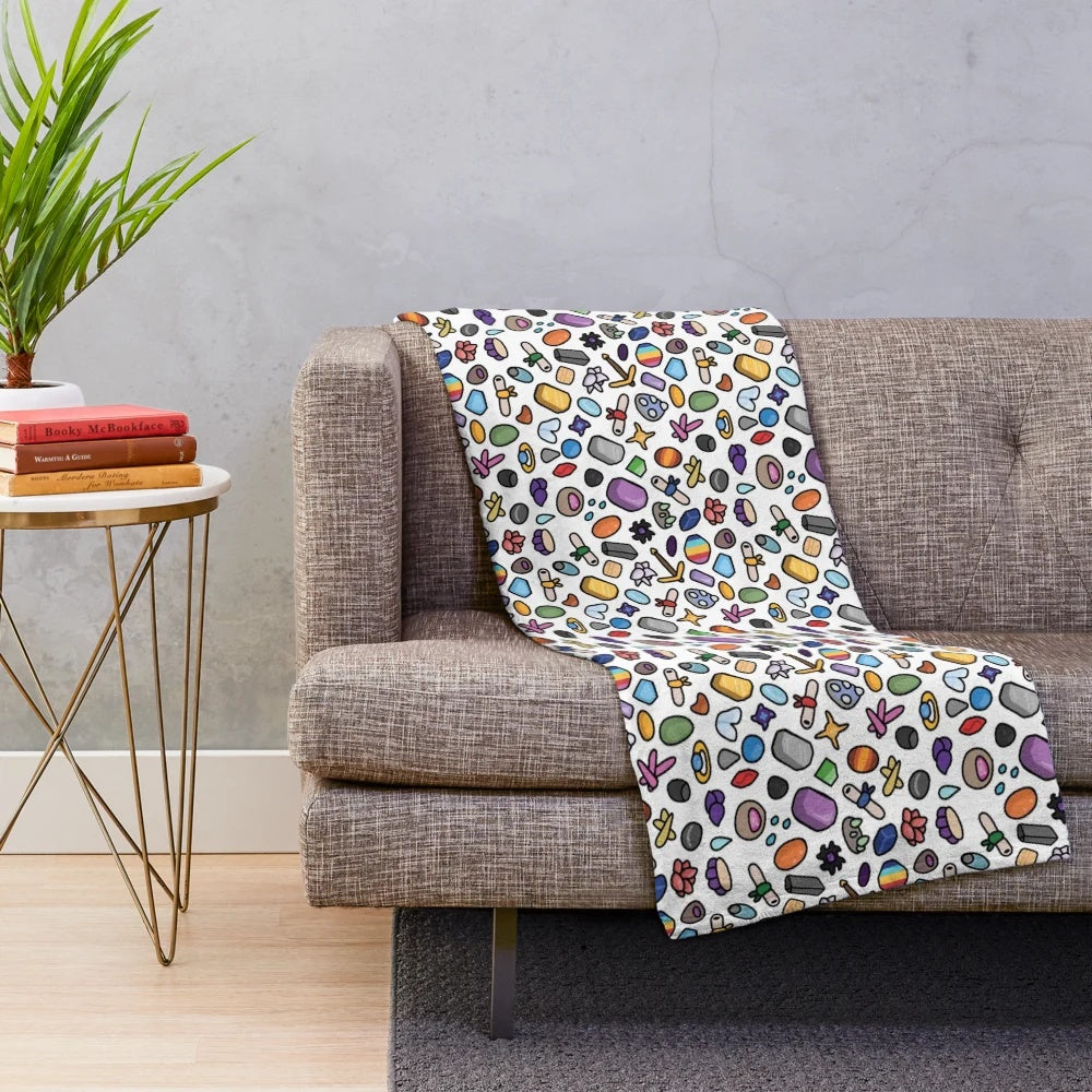 Mining-themed plush blanket with colorful doodle design