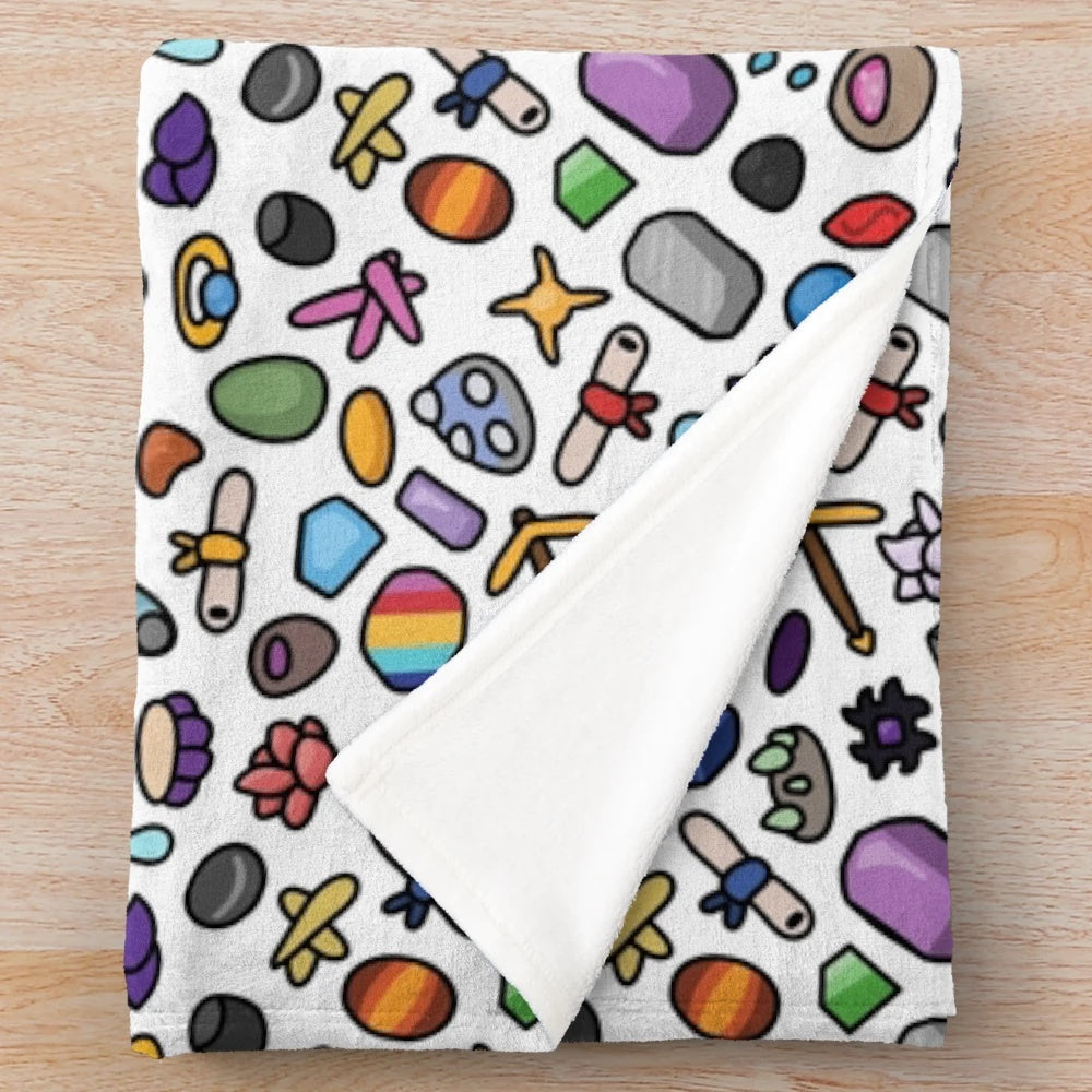 Mining-themed plush blanket with colorful doodle design