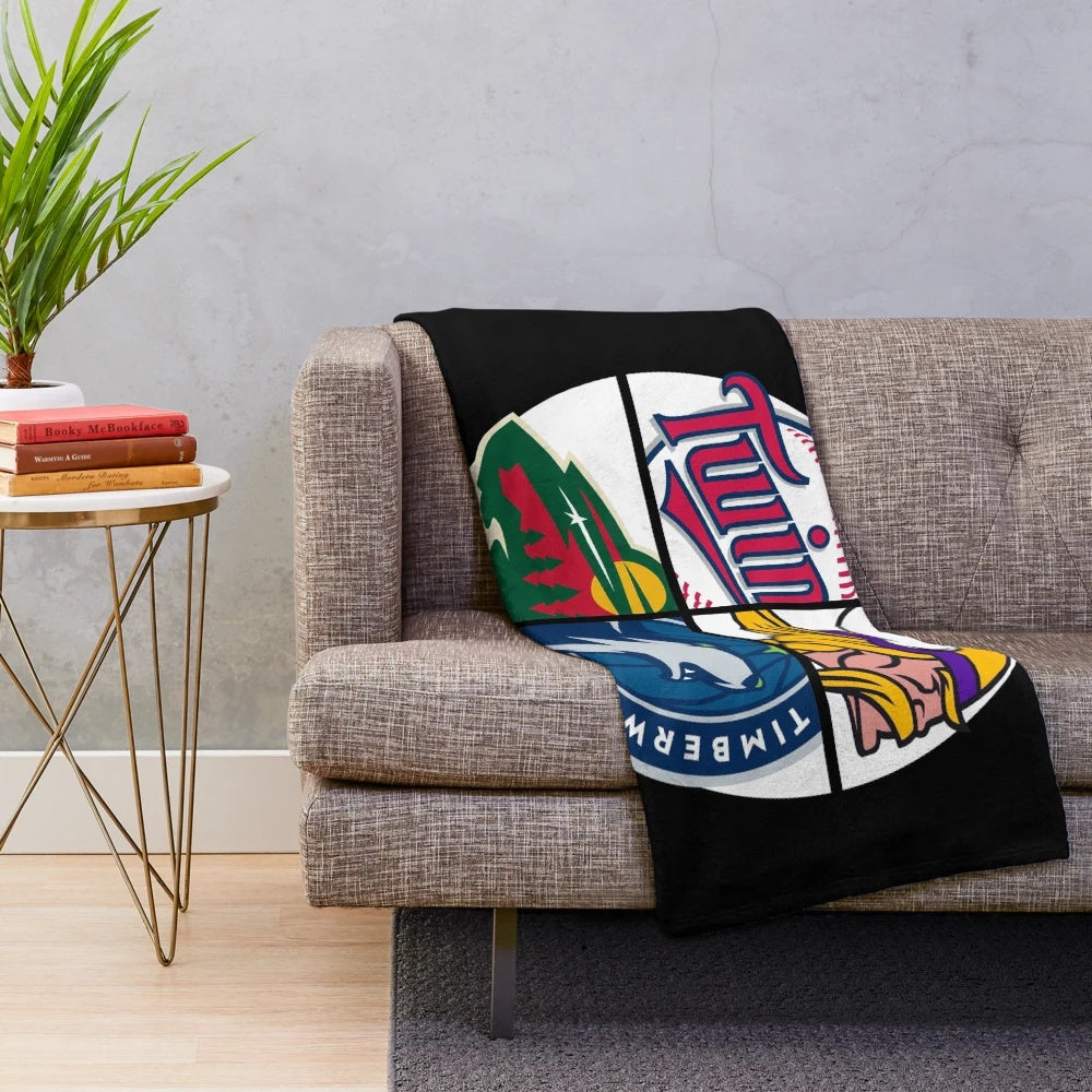 A soft and comfortable plush blanket featuring Minnesota sports team logos and imagery