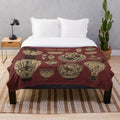 Plush blanket featuring ancient Minoan ceramic designs