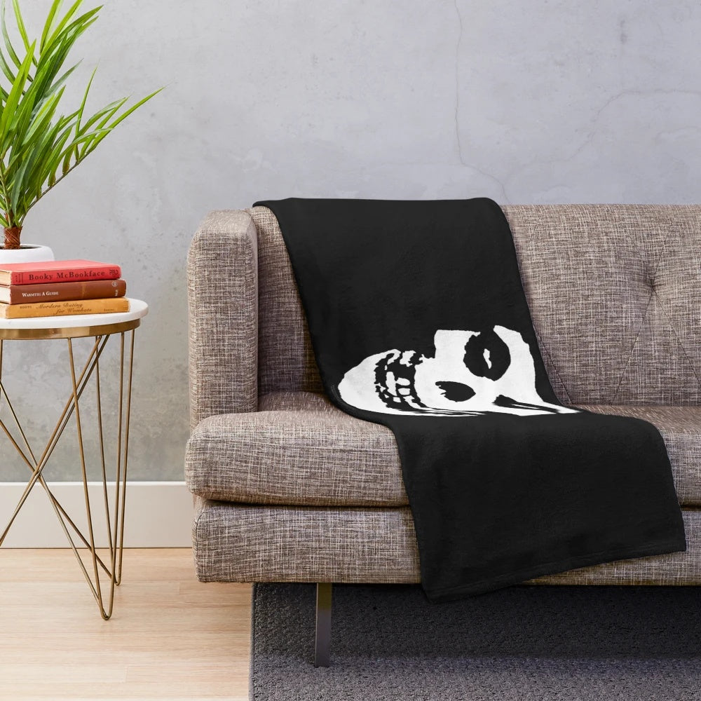 Misfits-inspired plush blanket featuring band's iconic logo and imagery
