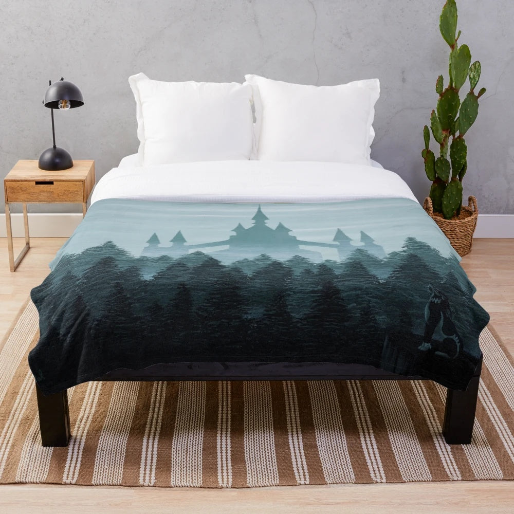 Soft and cozy plush blanket featuring a castle design