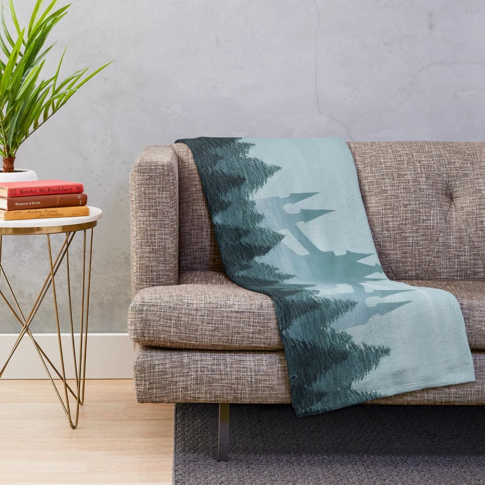 Soft and cozy plush blanket featuring a castle design