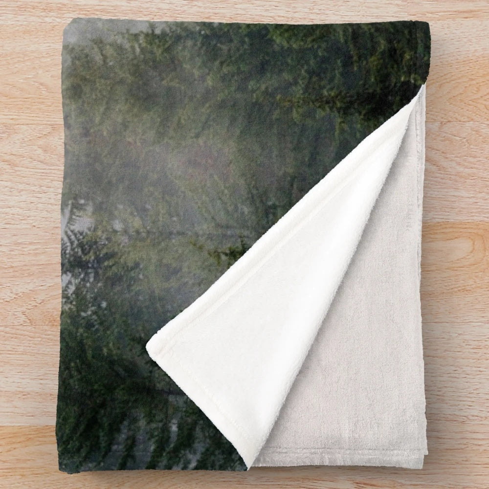 Soft and cozy misty forest plush blanket with minimalist design