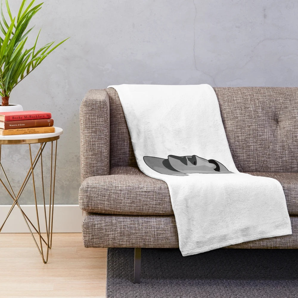 A plush, cozy Moai statue-inspired blanket
